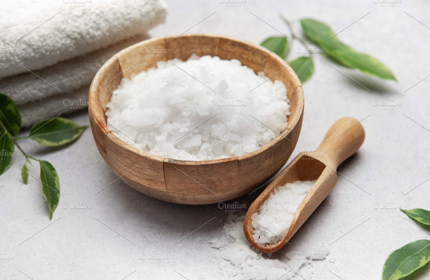 Magnesium flakes in wooden bowl with scoop for spa treatment, a Beauty & Fashion Photo by Olena Rudo