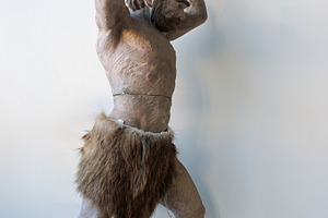 A realistic depiction of a primitive man, a School & Education Photo by Bepslabor