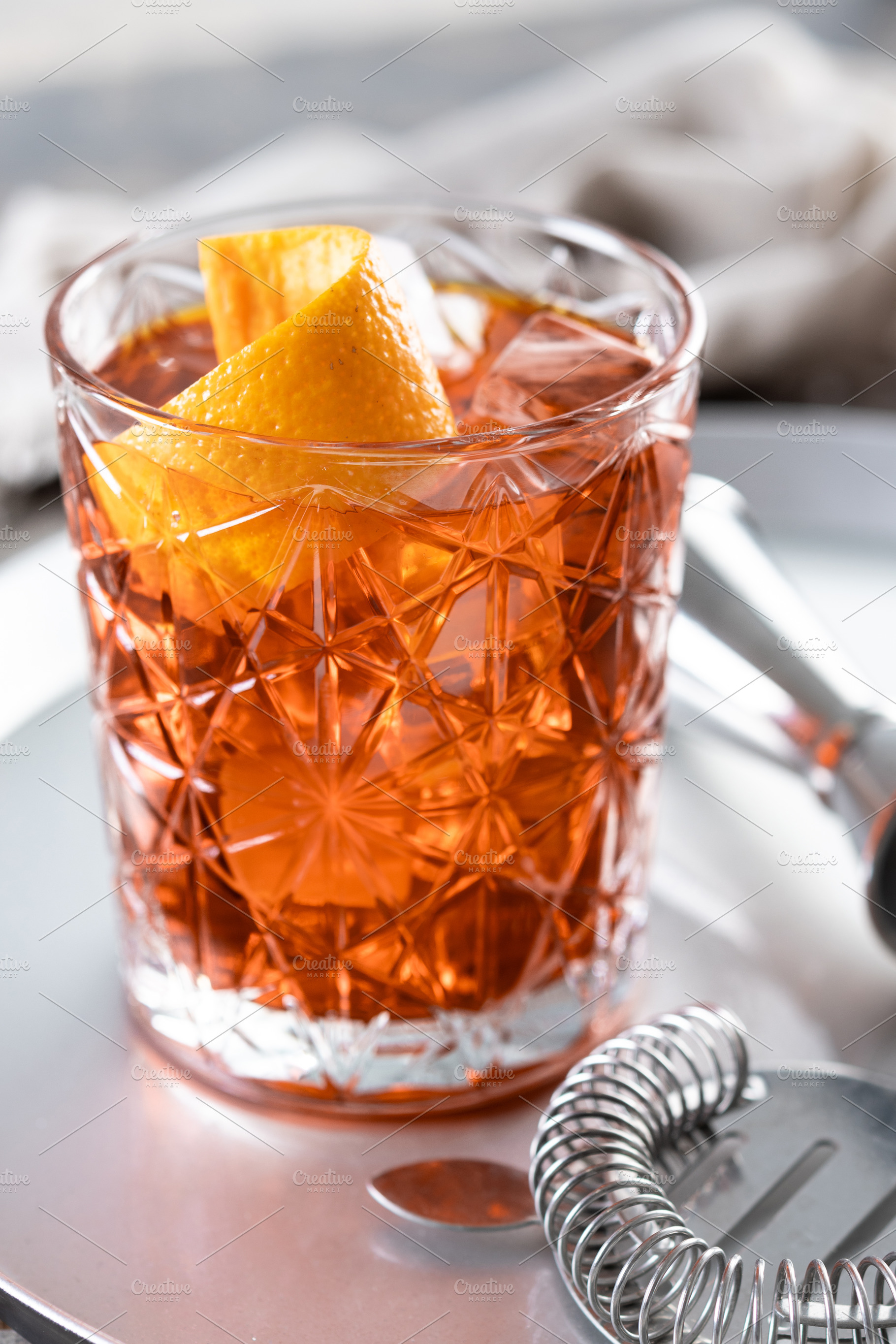Americano cocktail garnished with twist orange, a Food & Drink Photo by etorres69