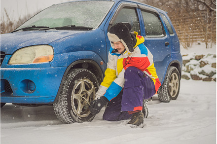 Winter accident on the road. A man, a Transportation Photo by Elizaveta Galitskaya
