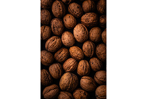 Walnuts background with black and, a Food & Drink Photo by Yulia Furman