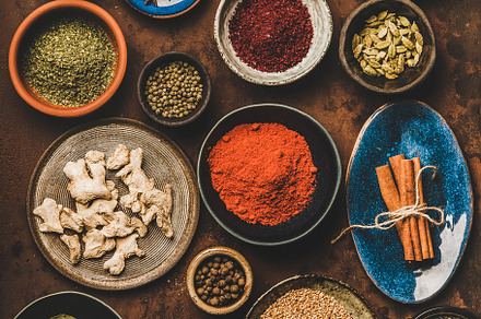 Flat-lay of various spices in bowls, a Food & Drink Photo by Foxys