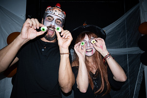 Friends playing with fake eyeballs at Halloween party, a Holiday Photo by etorres69