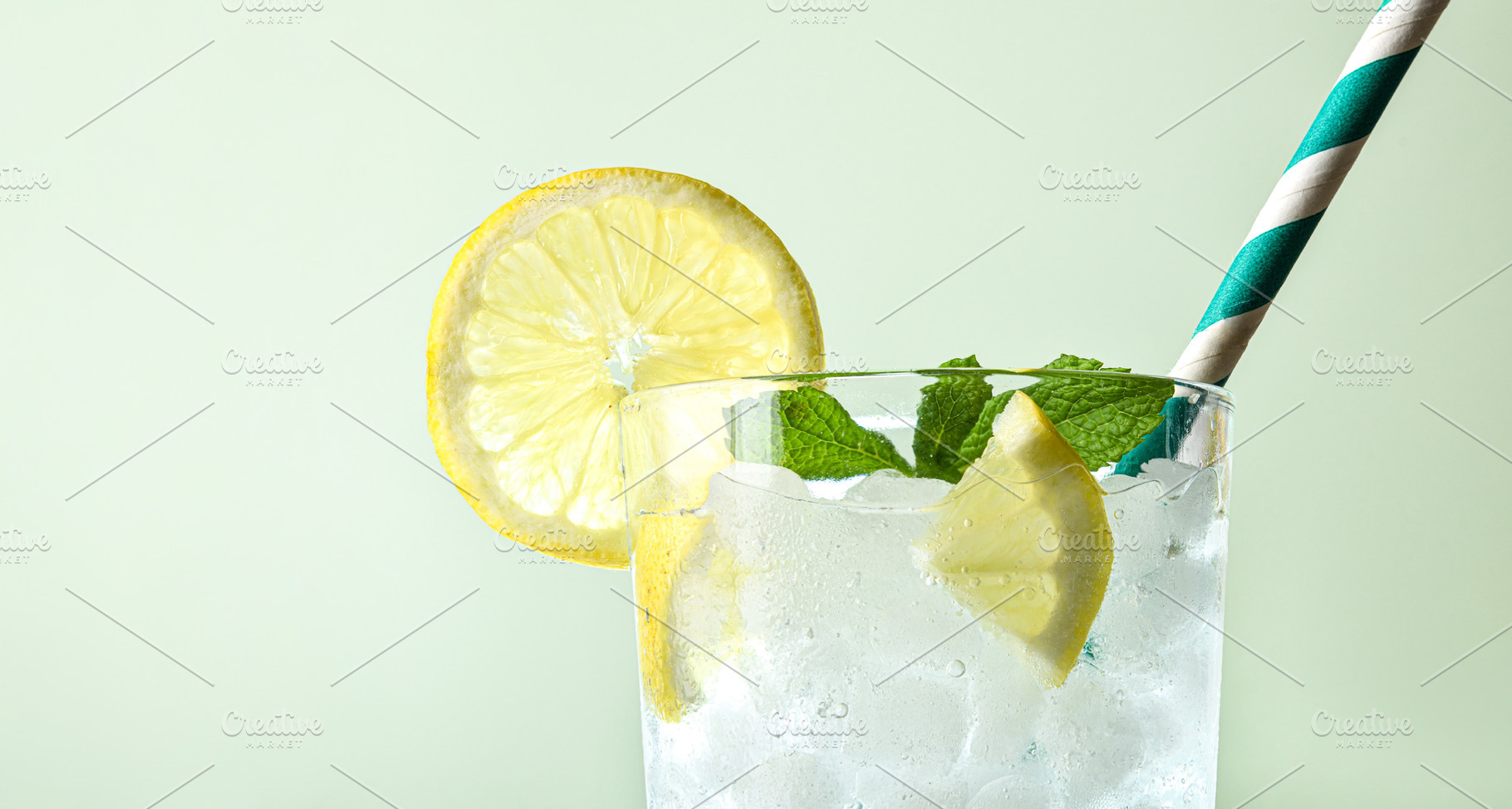 Very cold lemon soda drink with ice cubes isolated background, a Food & Drink Photo by Davizro's Market