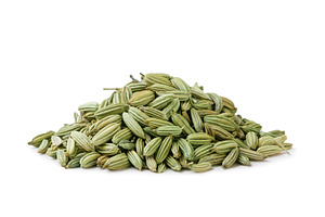 Pile of dry fennel seeds close-up on, a Food & Drink Photo by innakreativ