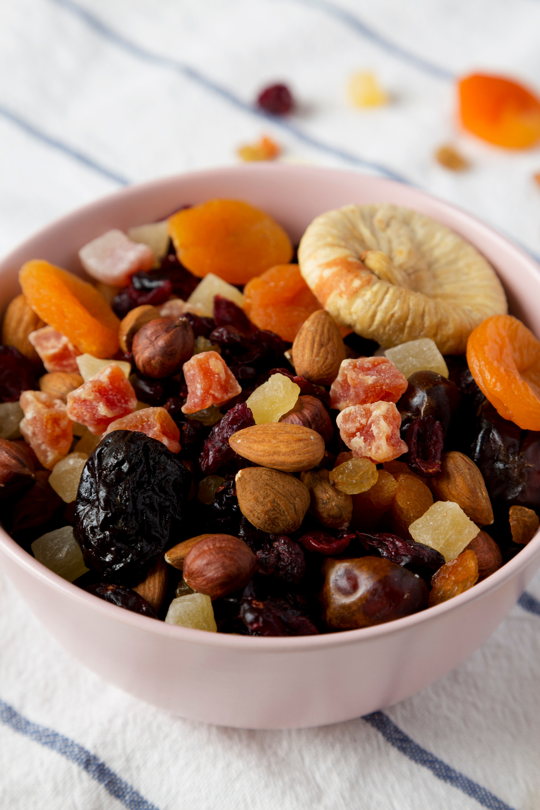 Dried fruits and nut mix featuring assortment, apricot, and almond