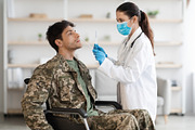 Doctor taking sample for PCR test from disabled soldier, a Photo by Prostock-Studio (Thumbnail 2 of 4)