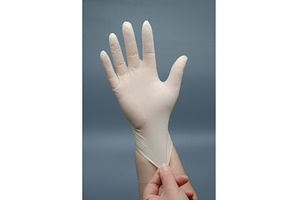 White latex medical glove on a hand, a Health & Medical Photo by Rohan Photography