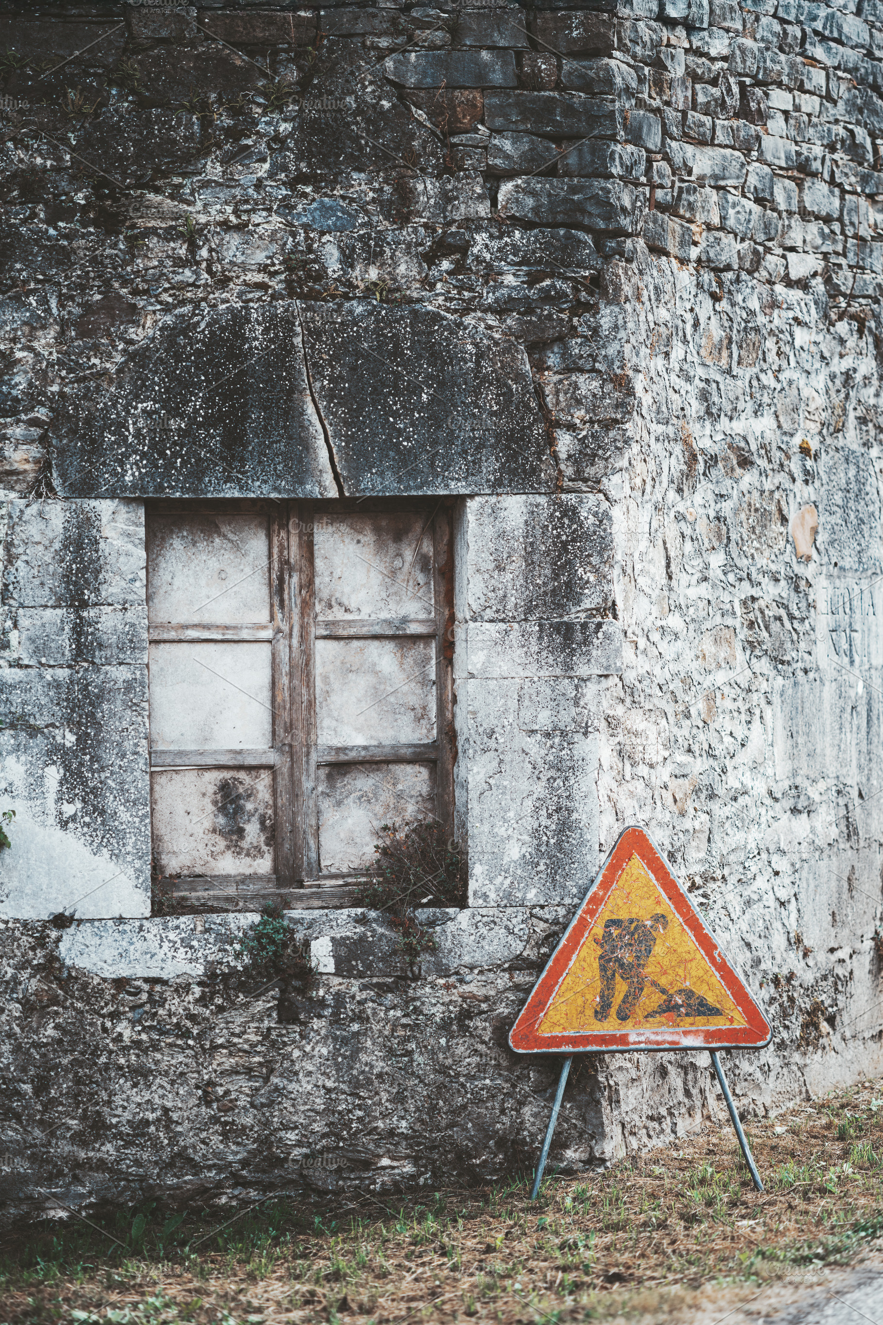 Old wall with warning sign, an Architecture Photo by SkyNext
