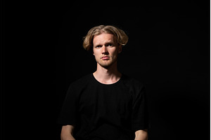 Young blond man staring directly, a Person Photo by volodymyrshtun13795