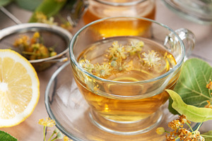 Linden flower herbal tea with honey and lemon, a Food & Drink Photo by Olena Rudo