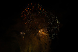 Fireworks exploding against black background, a Holiday Photo by rubenchase