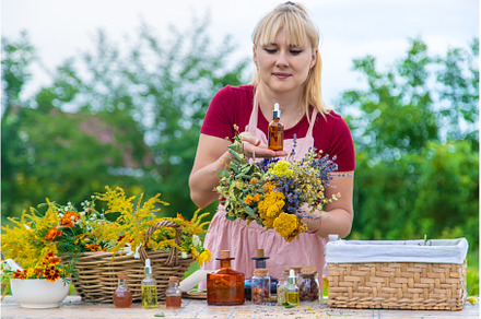 Woman with medicinal herbs and, a Nature Photo by yanadjana