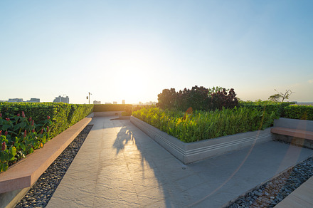 Sky garden on private rooftop of condominium or hotel, high rise, a Background Photo by Tampatra