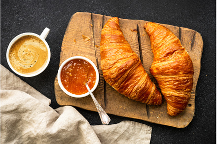 Croissant with jam on cutting board, a Food & Drink Photo by Nadia-nb