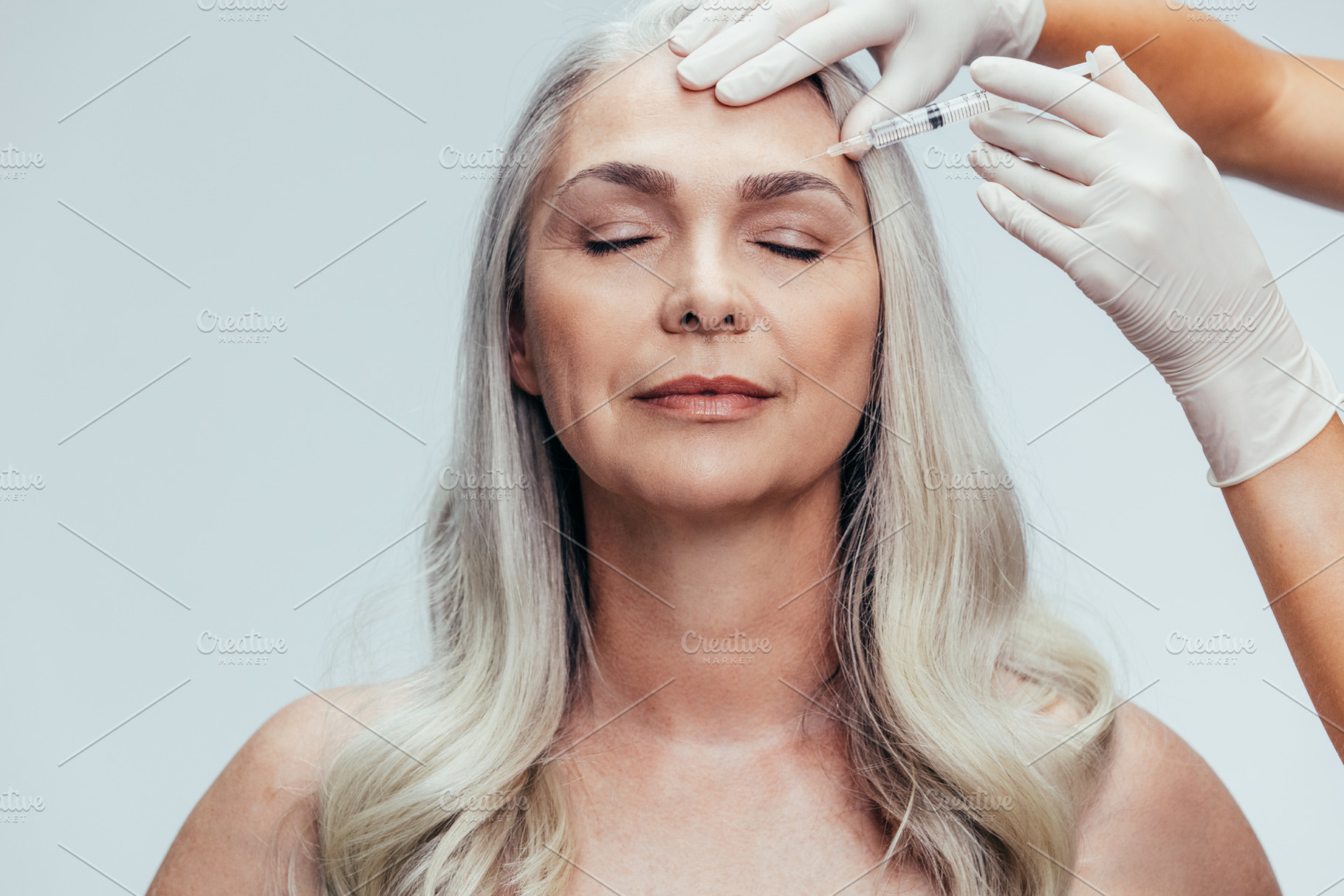 Senior woman getting cosmetic inject, a Beauty & Fashion Photo by Jacob Lund