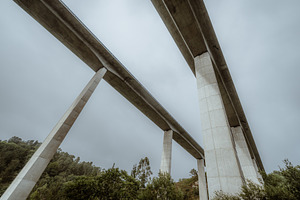 Concrete viaduct wide angle view, a Transportation Photo by SkyNext