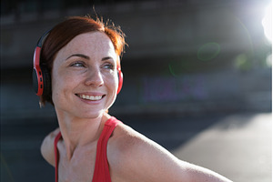 Sporty woman runner preparing for, a Person Photo by HalfPoint