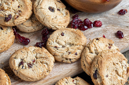 delicious dried cookies made of high-quality flour with dried red cranberries o, a Photo by MyPhotos