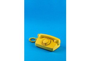 Retro vintage yellow rotary, a Technology Photo by Yulia Furman