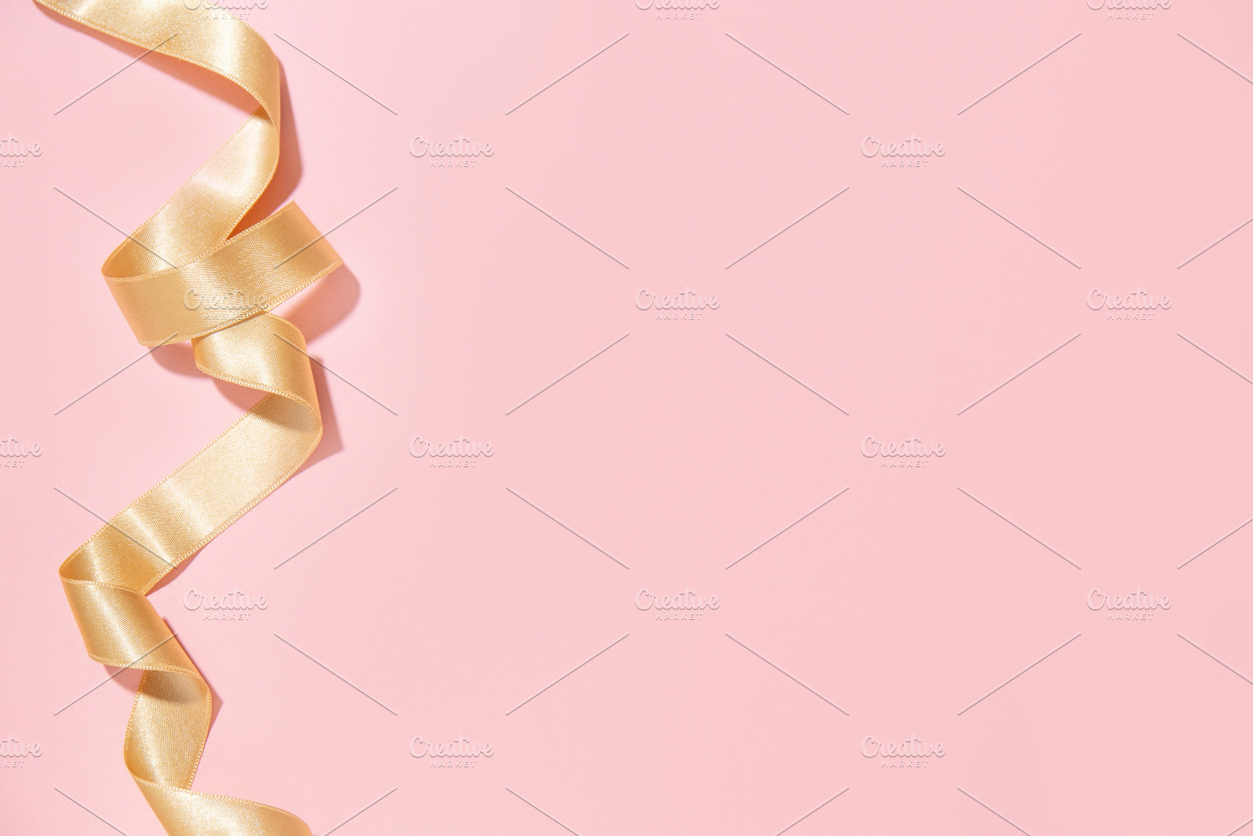 Simple golden ribbon on pink backgro, a Beauty & Fashion Photo by Valeria Art
