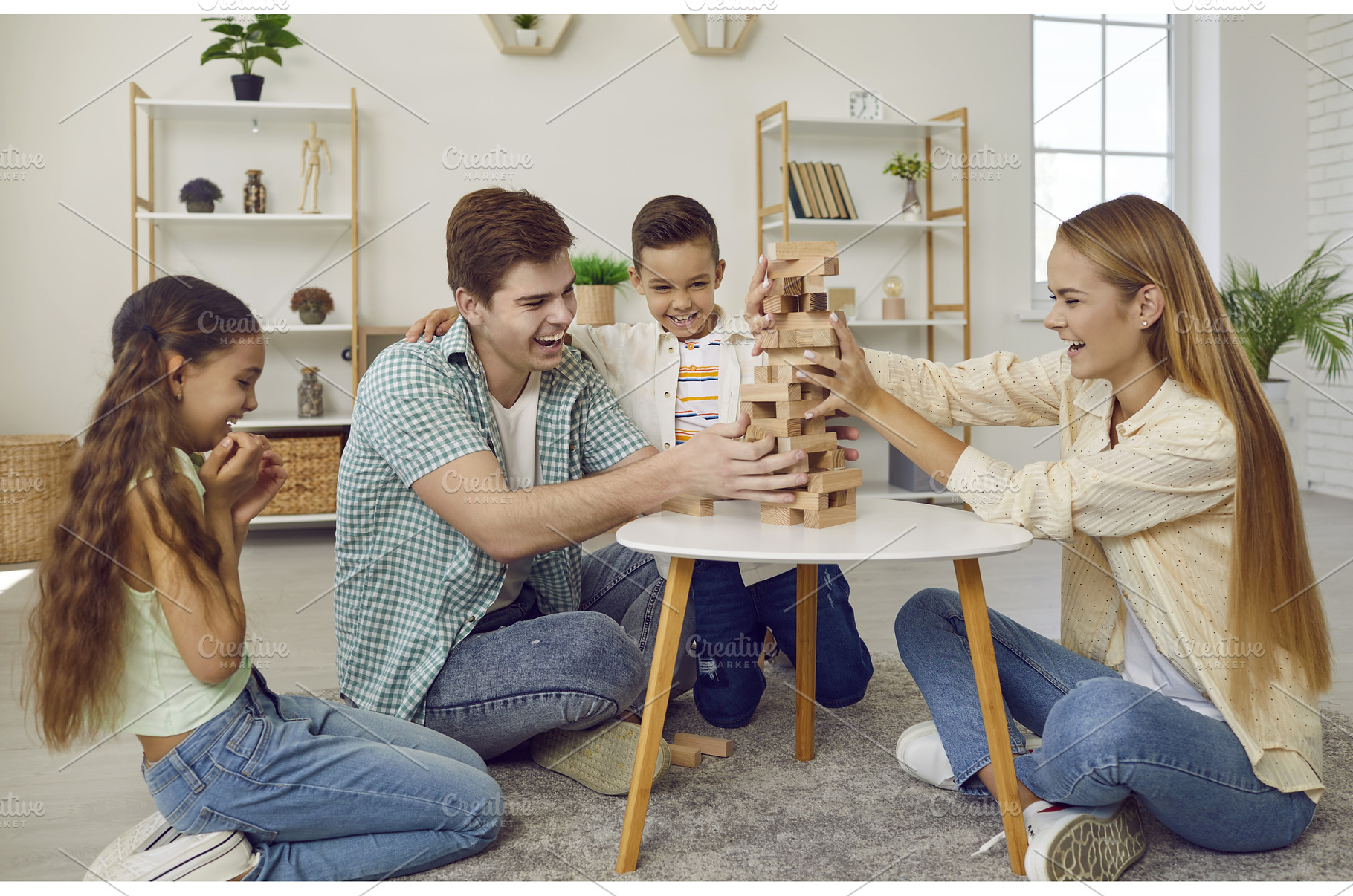 Happy parents together with little, a Person Photo by StudioRomantic