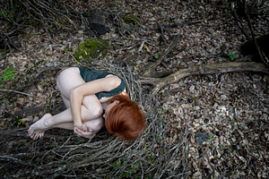 Conceptual image of a woman curled i, a Person Photo by Imaginarium