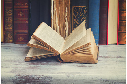 Set of books featuring books, book, and background, an Arts & Entertainment Photo by Neirfy