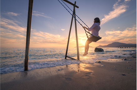 Happy young woman on wooden swing in, a Person Photo by den-belitsky