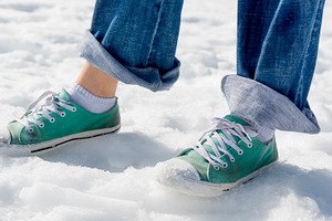 Shoes In Snow, a Person Photo by THP Creative