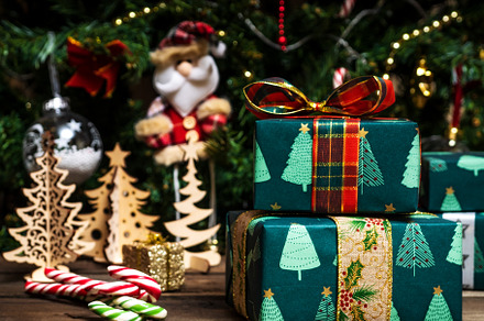 Gift boxes on the wooden table stock photo containing christmas and present, a Holiday Photo by photoWorkshop