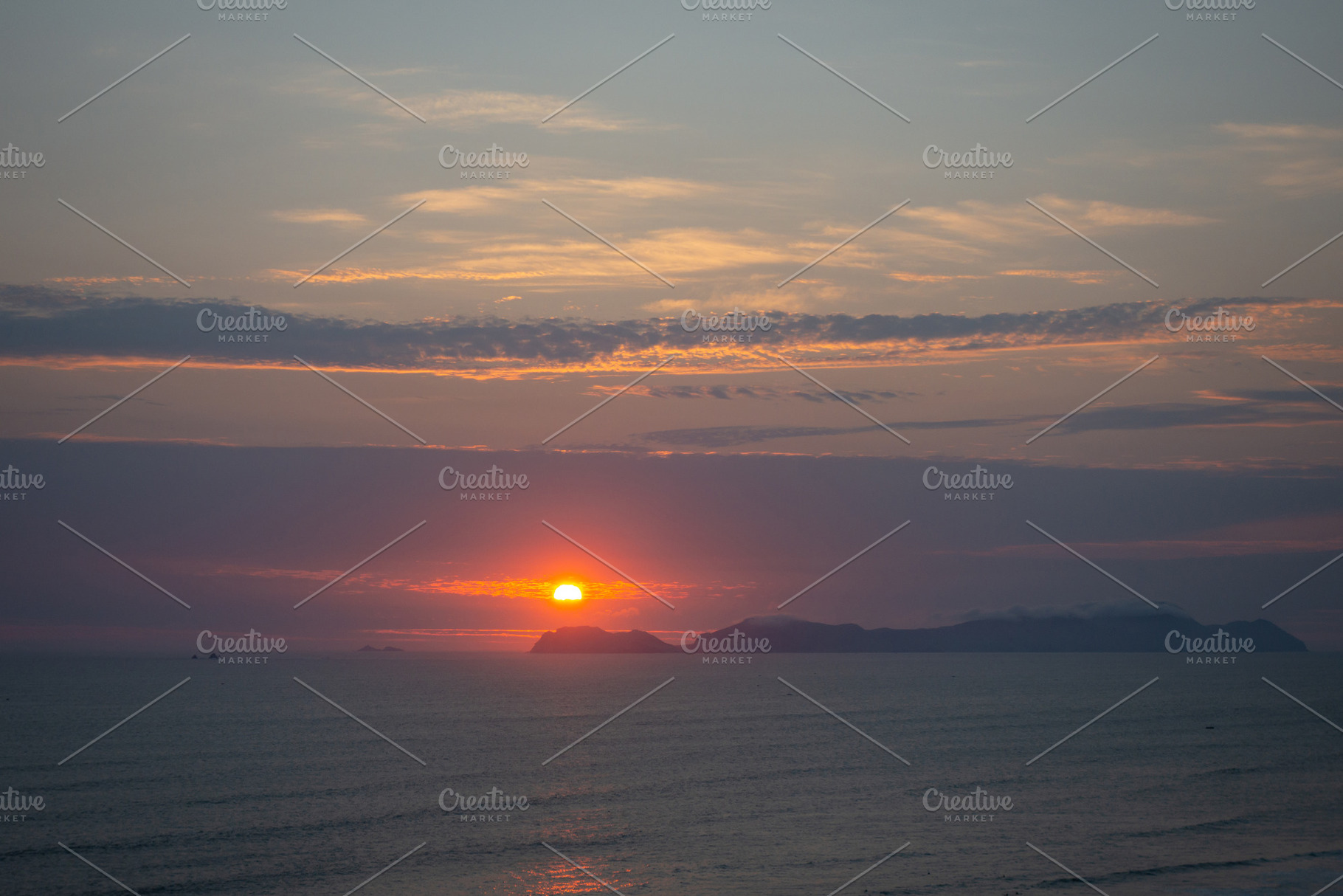 Sunset over the bay and Isla San Lorenzo in Lima, Peru, a Nature Photo by GoodGoods