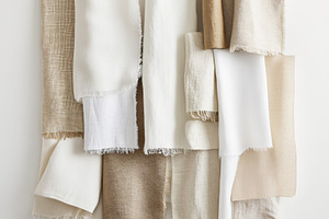 Rolls of linen fabric in various neu, a Photo by Dvoevnore photos
