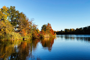 Autumn lake scene with colorful trees and clear reflections in Southern Illinoi, a Photo by AS photostudio