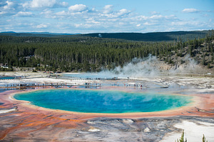 Colorful geyser crater yellowstoneto featuring environment, pond, and america