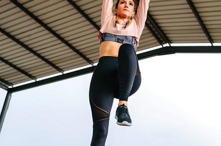 Young woman training with dumbbells outdoors, a Sports & Recreation Photo by davidpereiras