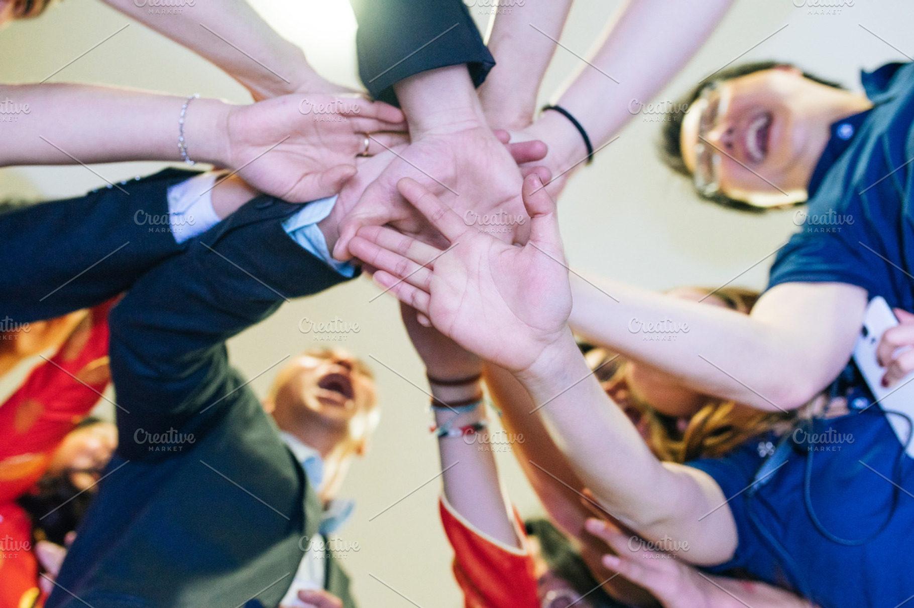 Team member cheering containing hands, cheer, and hand