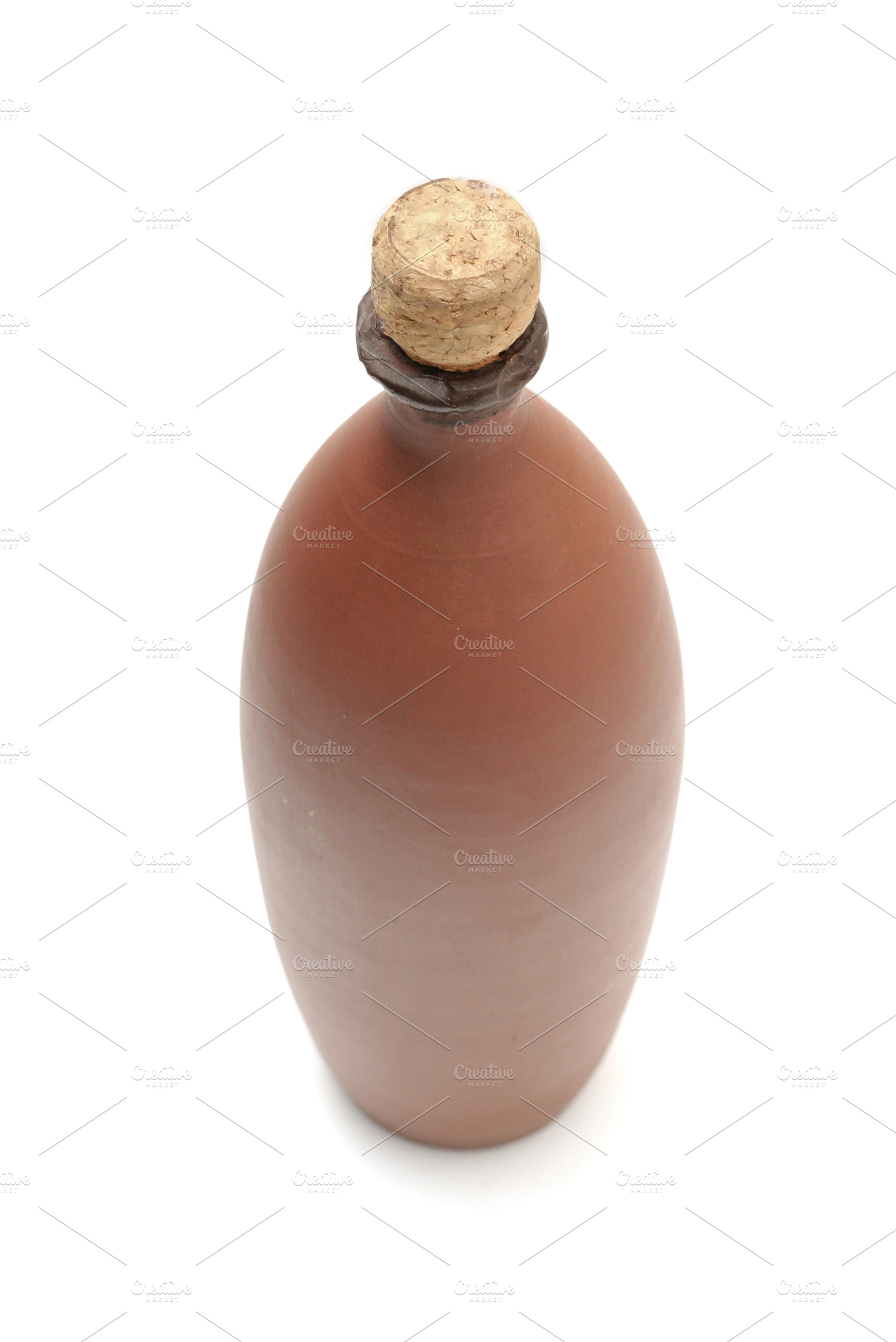 Clay bottle with vine isolated, a Photo by saiko3p