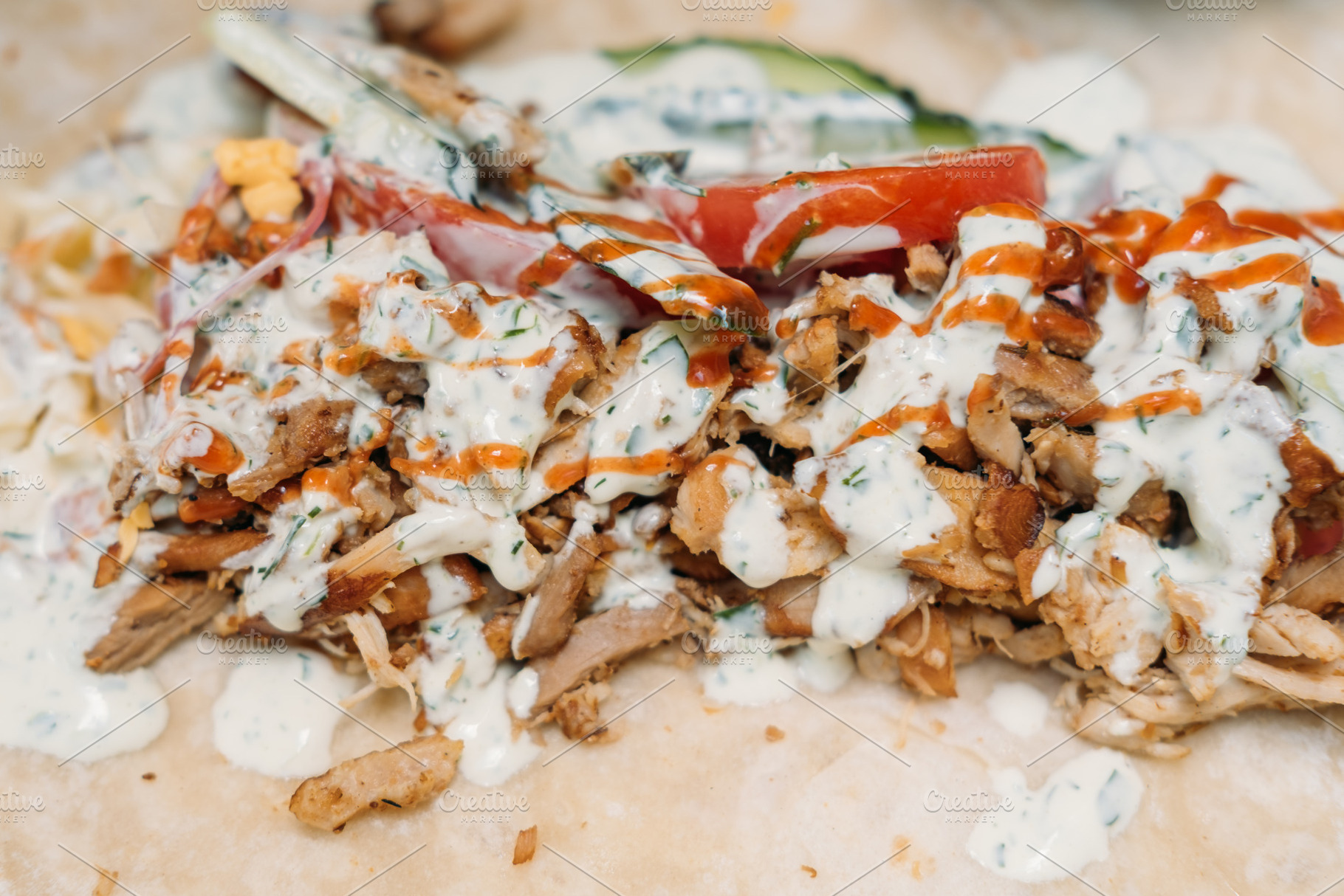 Chicken shawarma doner kebab meat sauce fast food, a Food & Drink Photo by Photo Drive Studio