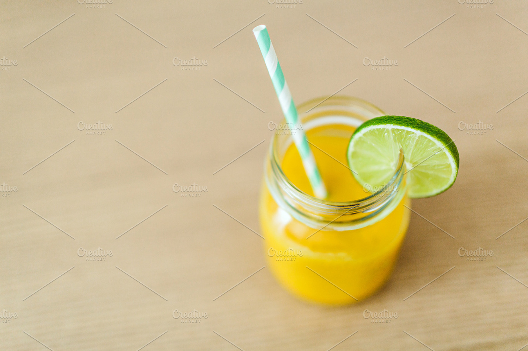 Fruit smoothie featuring fruit, smoothie, and lime