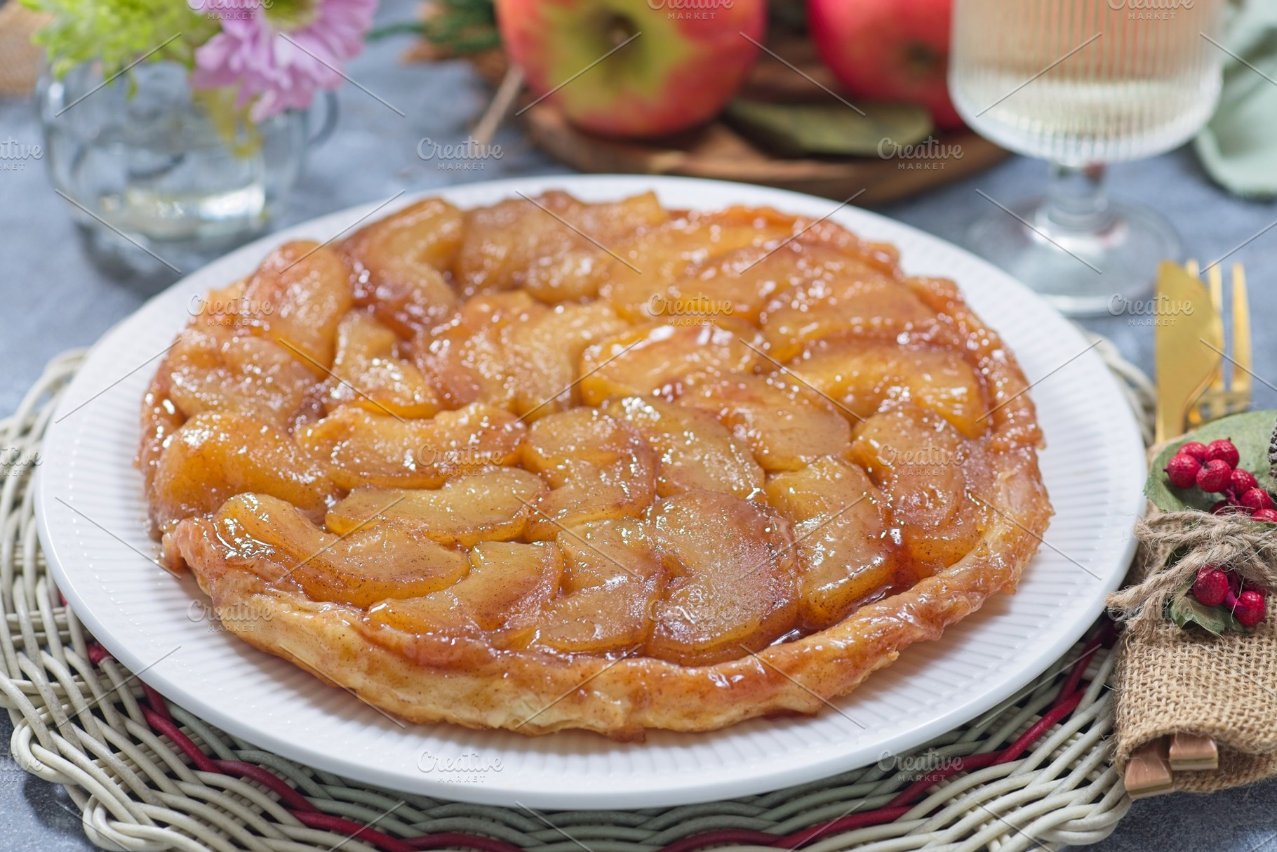 Caramelized apple Tart Tartin on plate, french upside down cake, horizontal, a Food & Drink Photo by iuliia_n