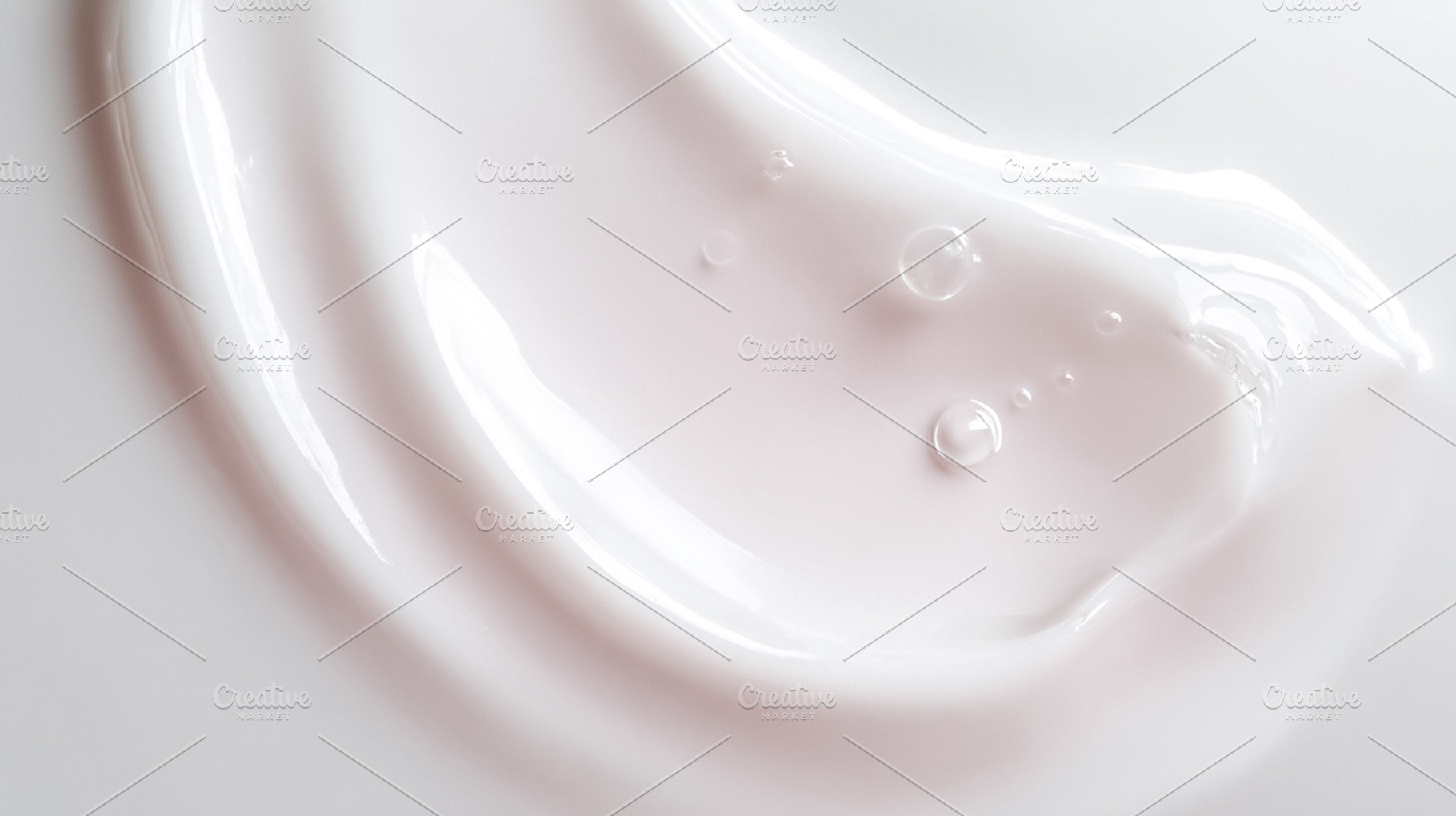 White cosmetic cream or lotion creating a smooth texture and sof, a Photo by Studio ANNA