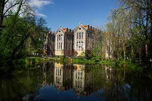 Historic European Building Reflected in Water in Caldas da Rainha, Portugal, a Photo by AS photostudio