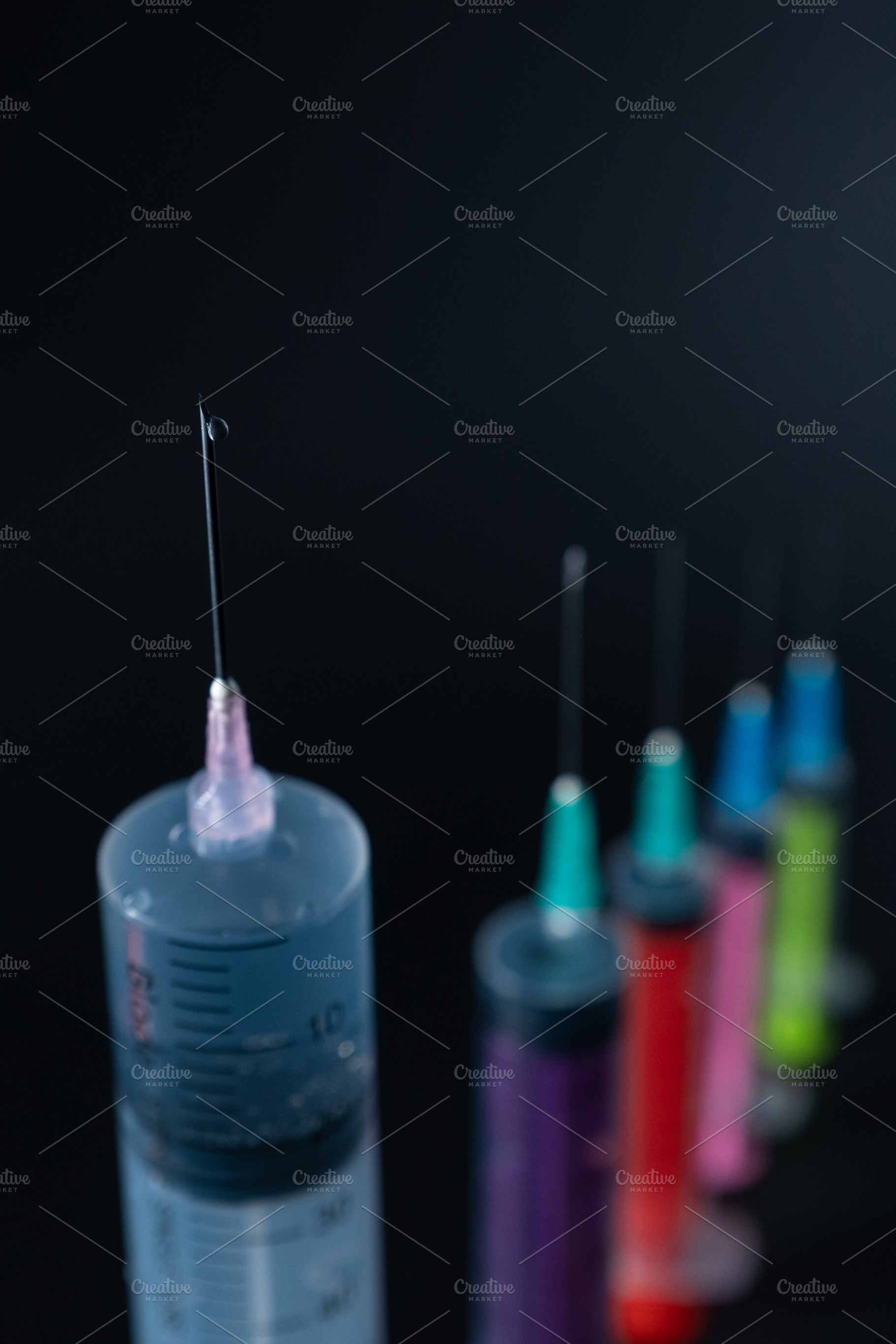 Sharp Focus on Syringe Needle Tip with Fluid Drop. A composition of various siz, a Health & Medical Photo by Rohan Photography