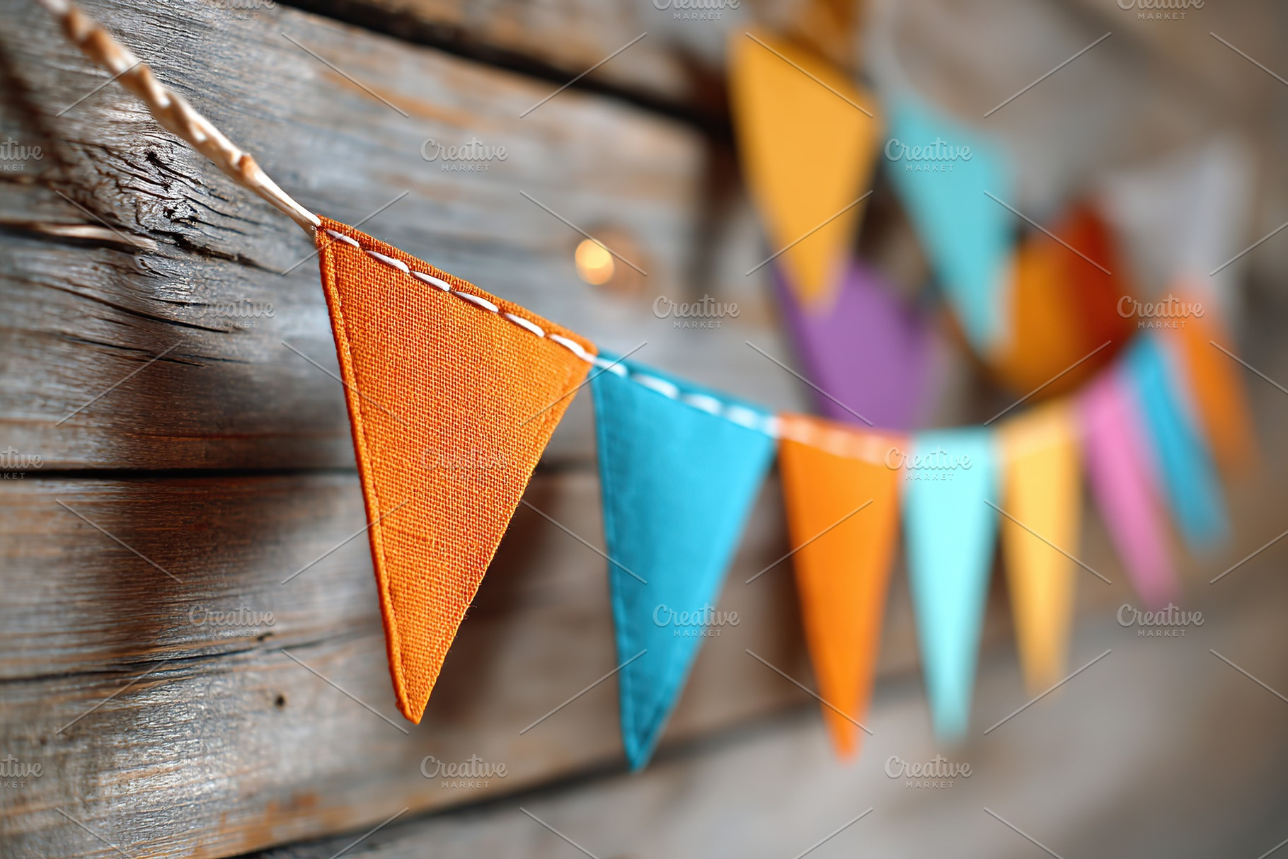 Colorful paper party flags decorate a rustic wooden wall for a festive celebrat, a Photo by AlyaAnd