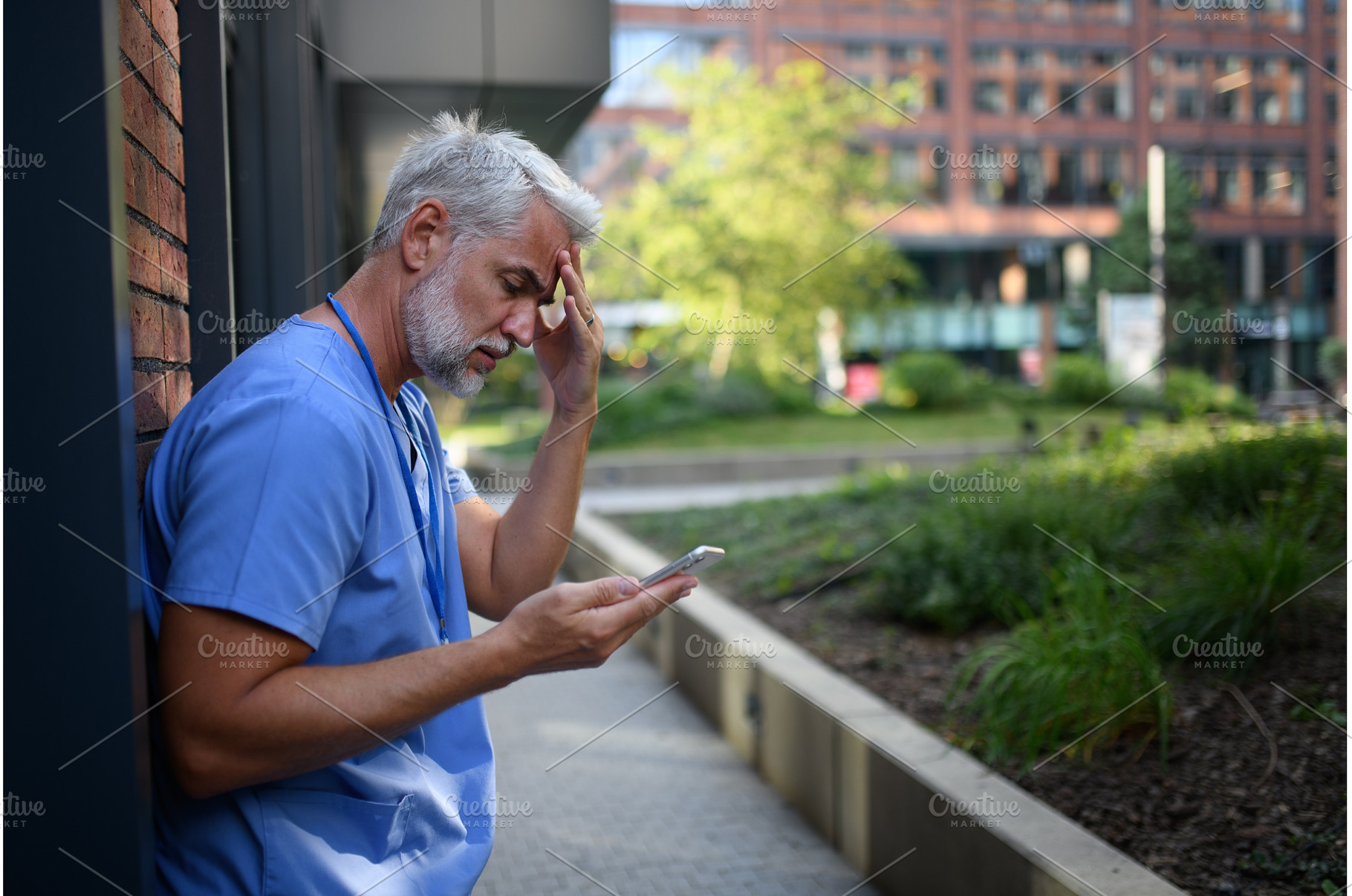 Frustrated and burnt-out doctor, a Health & Medical Photo by HalfPoint