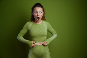 Stomach Pinch: Body Image Surprise, a Person Photo by Alliance Images