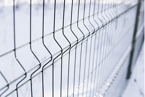 Closeup of welded metal fence with, an Industrial Photo by volodymyrshtun13795