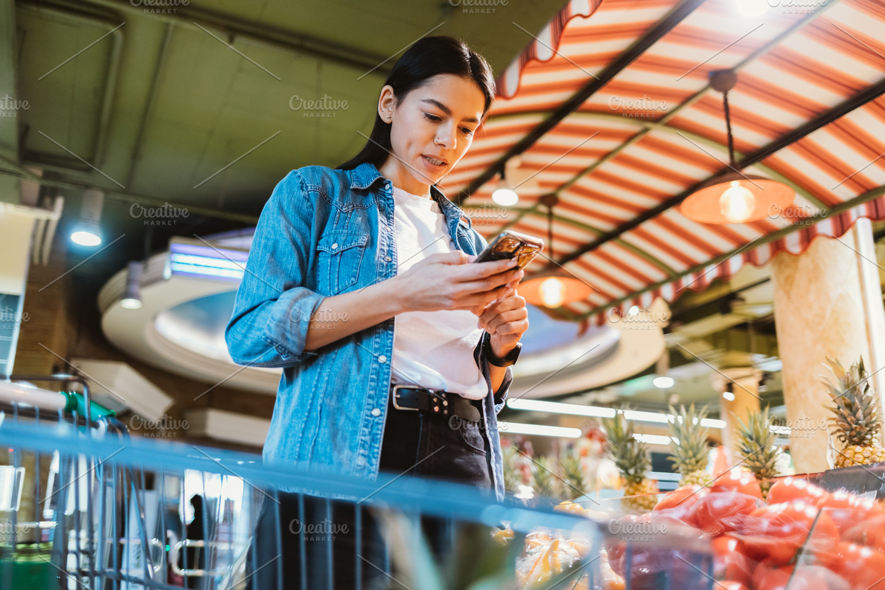 Portrait of young brunette woman with mobile phone, a Person Photo by progressman