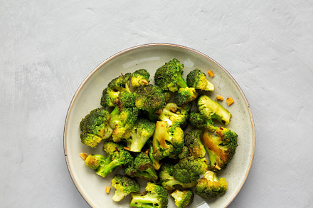 Homemade Pan-Fried Broccoli on a Plate, top view. Flat lay, over, a Food & Drink Photo by LiudmylaChuhunova